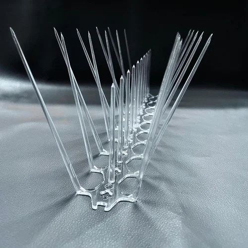 Close-up of stainless steel invisible grill cables