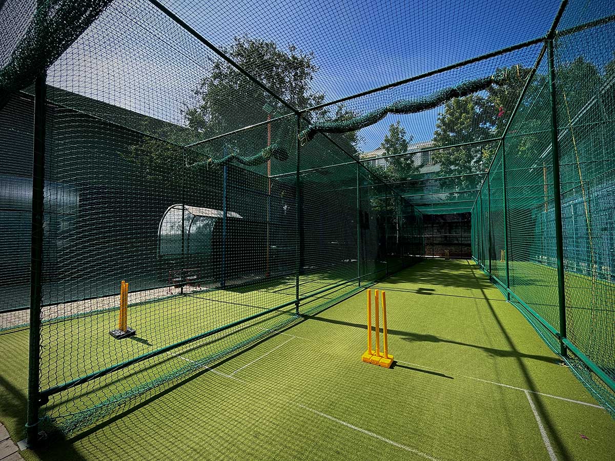 Cricket practice net installed on a society terrace